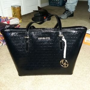 Michael Kors black pocket book